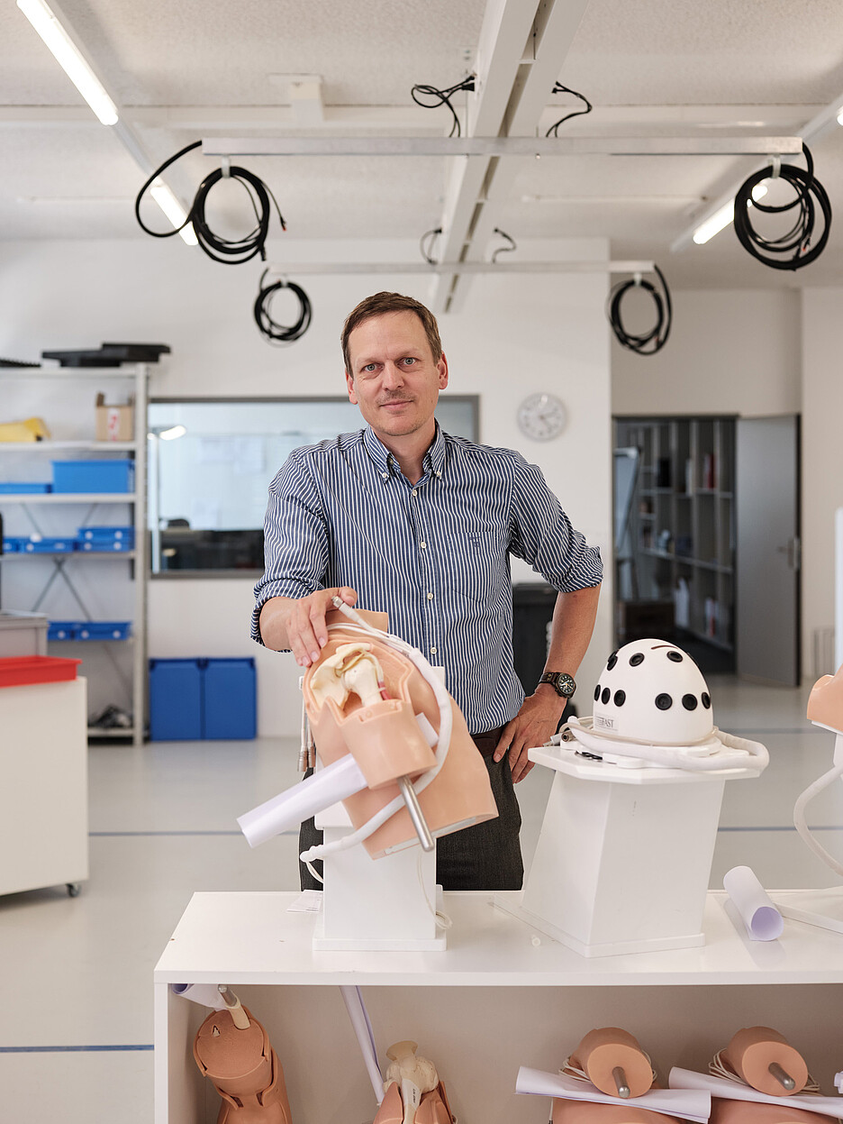 Co-founder Daniel Bachofen inspects the simulators for surgeons at VirtaMed’s production premises in Schlieren.