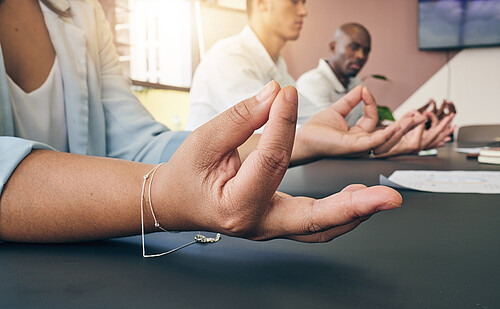Yoga, office or hands of business people in meditation for mental health or breathing exercise together. Startup team, wellness closeup or calm employees relax for stress management or zen peace